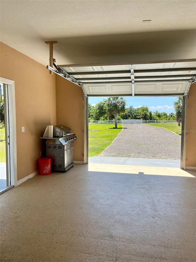 8412 Grove Blvd, Punta Gorda, FL 33982 - garage with baseboards