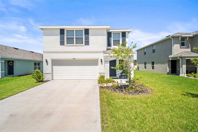 3108 Rock Sound St, Bradenton, FL 34208 - traditional home featuring a garage, stucco siding, driveway, and a front yard