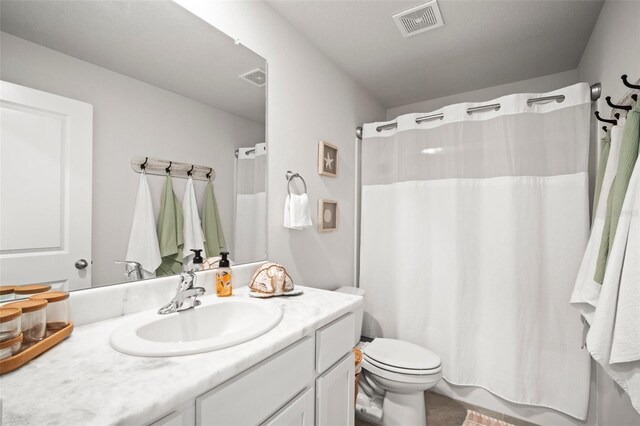3108 Rock Sound St, Bradenton, FL 34208 - bathroom featuring vanity, toilet, and curtained shower
