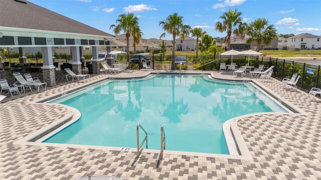 3108 Rock Sound St, Bradenton, FL 34208 - community pool with a patio and a residential view