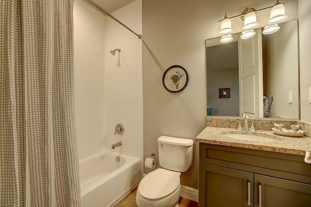 full bathroom featuring toilet, vanity, and shower / bathtub combination with curtain