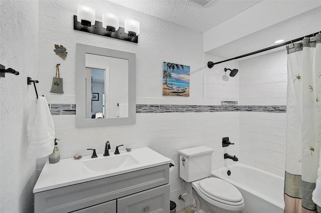 2127 Corfell St, Port Charlotte, FL 33948 - full bath with tile walls, shower / bathtub combination with curtain, vanity, a textured wall, and toilet