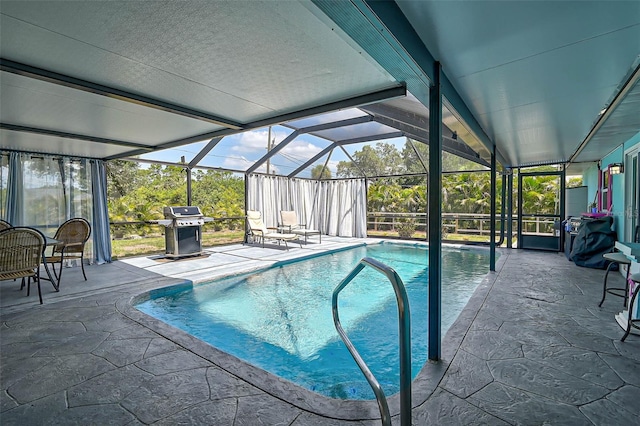 2127 Corfell St, Port Charlotte, FL 33948 - outdoor pool with a grill, a patio, and a lanai