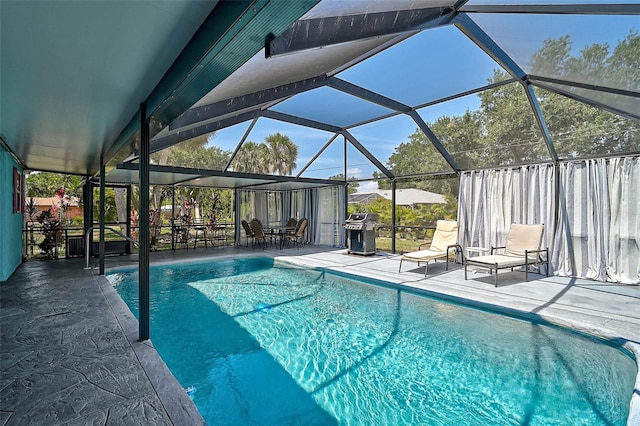 2127 Corfell St, Port Charlotte, FL 33948 - outdoor pool with grilling area, a patio, and a lanai