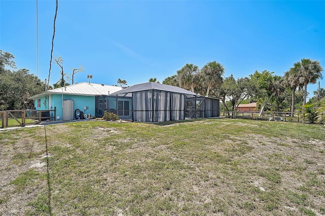 2127 Corfell St, Port Charlotte, FL 33948 - view of yard featuring glass enclosure
