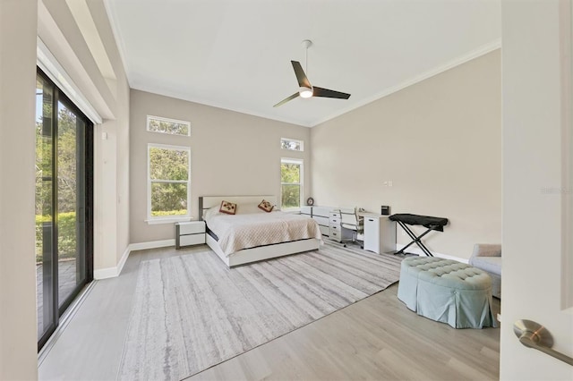 bedroom with wood finished floors, access to exterior, crown molding, baseboards, and ceiling fan