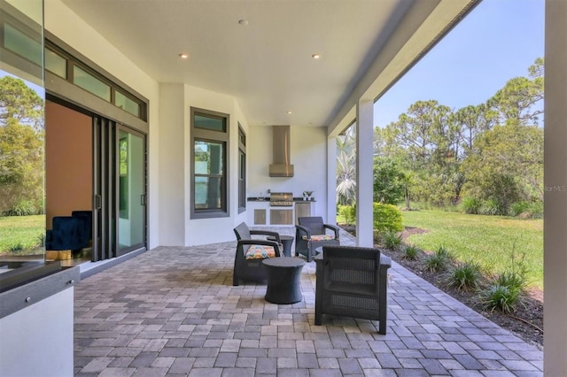 view of patio / terrace featuring an outdoor kitchen and grilling area