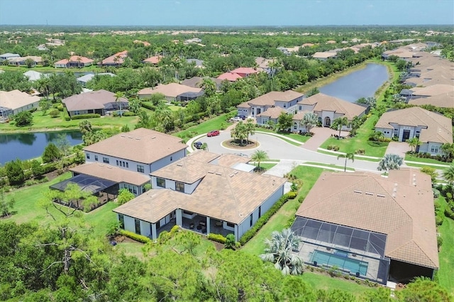 aerial view of residential area with a nearby body of water