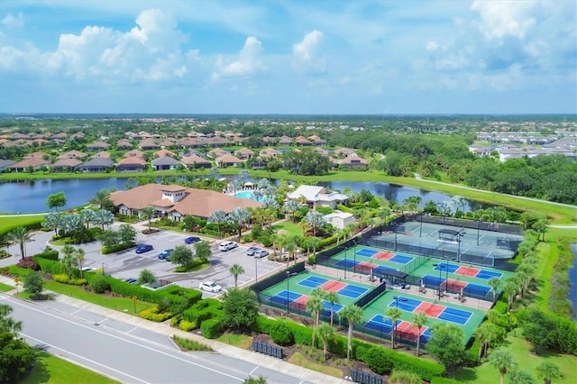 aerial perspective of suburban area featuring a large body of water