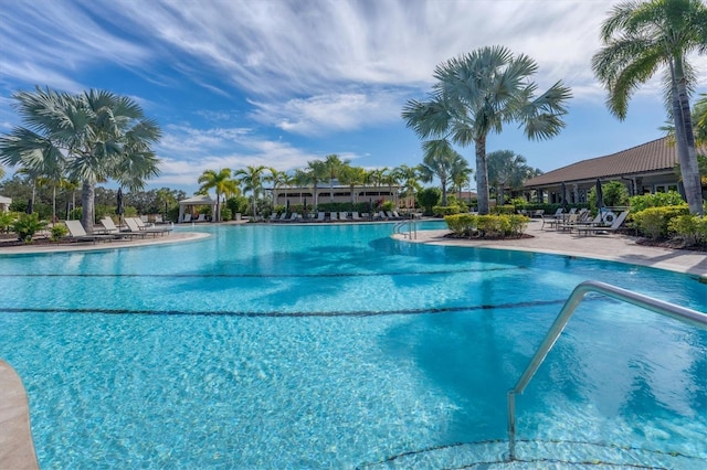 community pool featuring a patio area