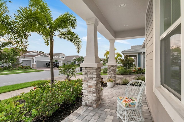 5770 Long Shore Loop, Sarasota, FL 34238 - porch featuring a residential view