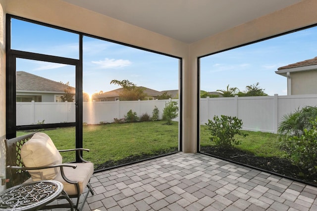 5770 Long Shore Loop, Sarasota, FL 34238 - unfurnished sunroom featuring plenty of natural light