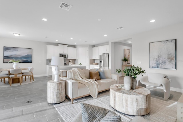 5770 Long Shore Loop, Sarasota, FL 34238 - living area featuring recessed lighting and light wood-type flooring