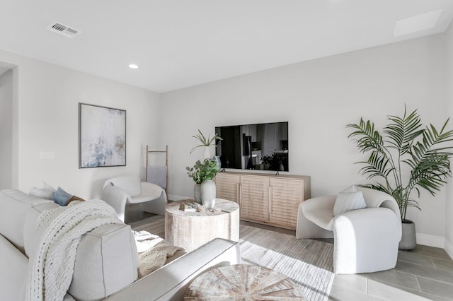 5770 Long Shore Loop, Sarasota, FL 34238 - living area with recessed lighting and light tile patterned floors