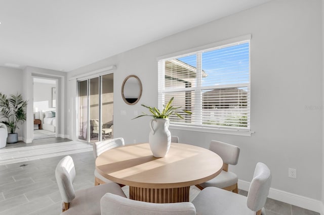 5770 Long Shore Loop, Sarasota, FL 34238 - dining area with healthy amount of natural light