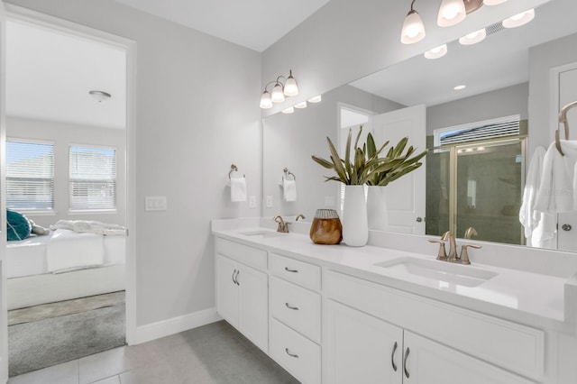 5770 Long Shore Loop, Sarasota, FL 34238 - bathroom featuring double vanity, tile patterned floors, and a stall shower