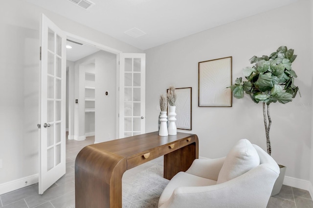 5770 Long Shore Loop, Sarasota, FL 34238 - home office featuring french doors and light tile patterned floors
