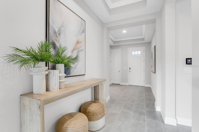 5770 Long Shore Loop, Sarasota, FL 34238 - entryway with a raised ceiling and light tile patterned floors