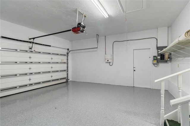 4443 Robin Hood Trl W, Sarasota, FL 34232 - garage with a garage door opener and electric panel