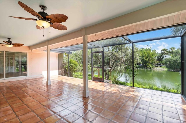 4443 Robin Hood Trl W, Sarasota, FL 34232 - view of patio / terrace featuring a water view, a ceiling fan, and glass enclosure