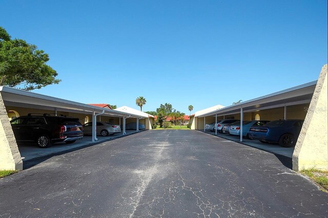 1314 57th St W Unit 1314, Bradenton, FL 34209 - view of covered parking lot