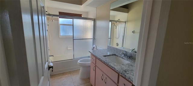 7102 52nd Dr E, Bradenton, FL 34203 - bathroom with vanity, toilet, tile patterned floors, and shower / bath combination with glass door