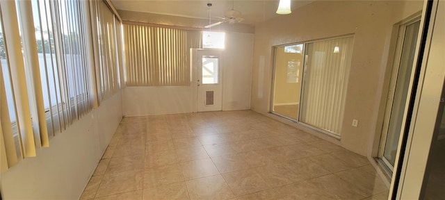 7102 52nd Dr E, Bradenton, FL 34203 - unfurnished room featuring light tile patterned floors