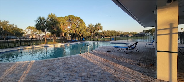 7102 52nd Dr E, Bradenton, FL 34203 - community pool with fence and a patio