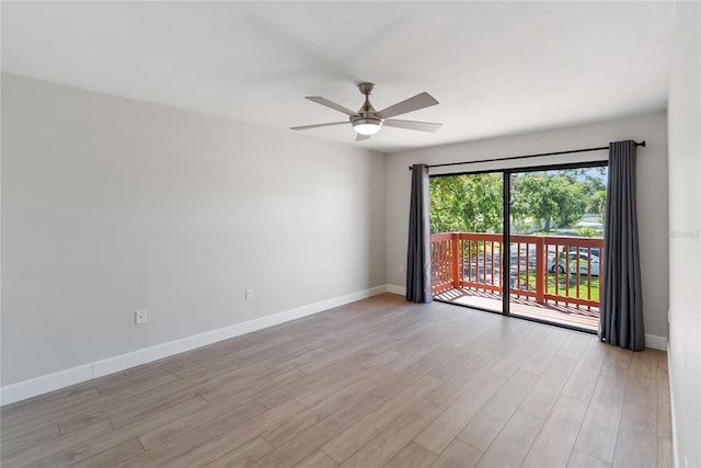 709 Sorrento Inlt Unit 709, Nokomis, FL 34275 - spare room with light wood-type flooring, ceiling fan, and baseboards