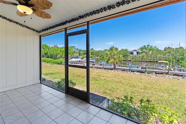 709 Sorrento Inlt Unit 709, Nokomis, FL 34275 - unfurnished sunroom with a water view and a ceiling fan