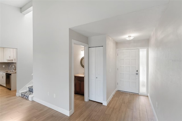 709 Sorrento Inlt Unit 709, Nokomis, FL 34275 - entrance foyer featuring light wood-type flooring and baseboards
