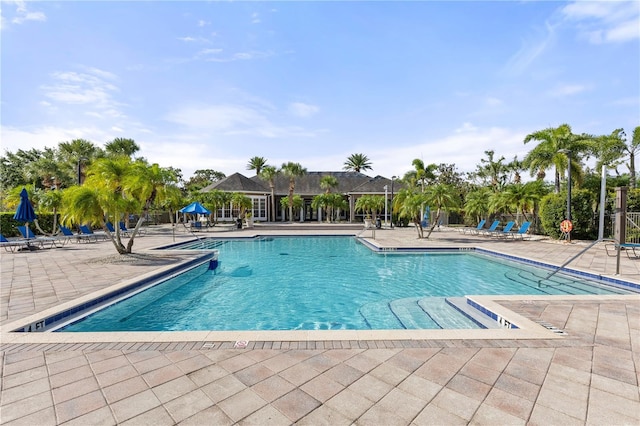 8926 Manor Loop Unit 201, Lakewood Ranch, FL 34202 - community pool featuring a patio