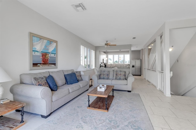 603 Cedars Ct, Longboat Key, FL 34228 - living room featuring a ceiling fan and light tile patterned floors