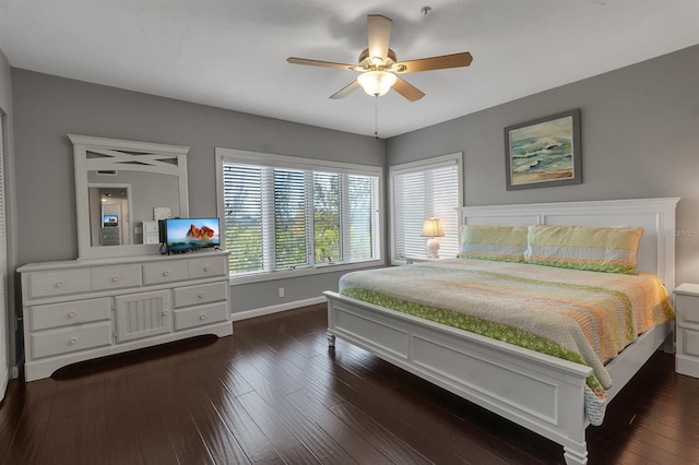 603 Cedars Ct, Longboat Key, FL 34228 - bedroom with baseboards, dark wood finished floors, and ceiling fan