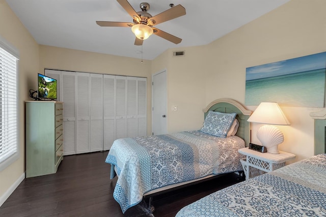 603 Cedars Ct, Longboat Key, FL 34228 - bedroom featuring wood finished floors, multiple windows, a closet, and ceiling fan