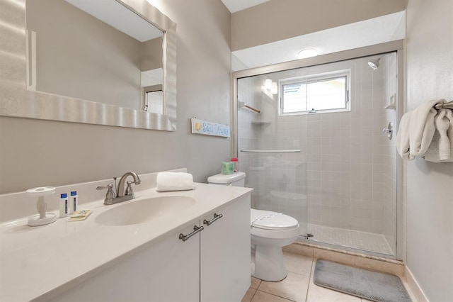 603 Cedars Ct, Longboat Key, FL 34228 - full bath featuring a shower stall, toilet, vanity, and tile patterned flooring
