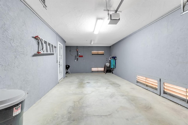 603 Cedars Ct, Longboat Key, FL 34228 - garage featuring a garage door opener