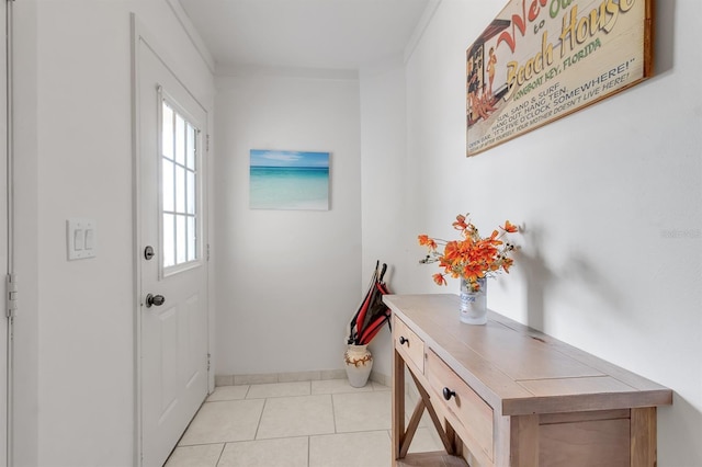 603 Cedars Ct, Longboat Key, FL 34228 - doorway featuring tile patterned floors and baseboards