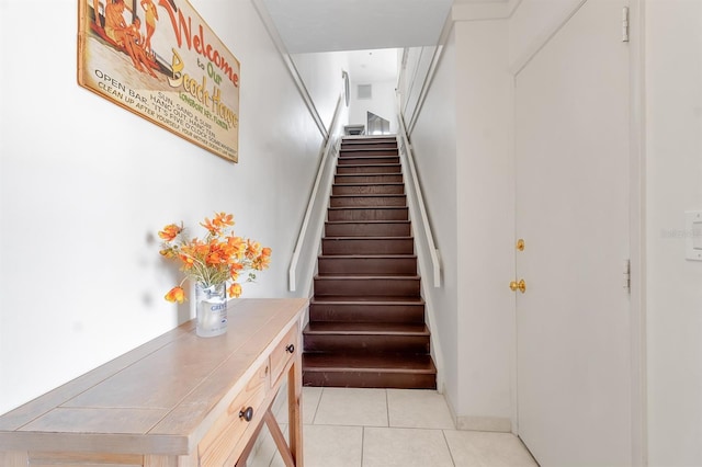 603 Cedars Ct, Longboat Key, FL 34228 - stairway featuring tile patterned flooring