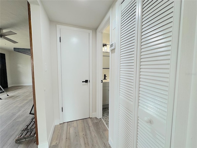 1902 24th Ave W, Bradenton, FL 34205 - hall featuring wood finished floors and baseboards