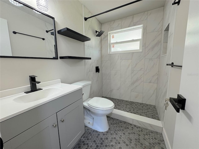 1902 24th Ave W, Bradenton, FL 34205 - full bath with a tile shower, vanity, toilet, and tile patterned flooring