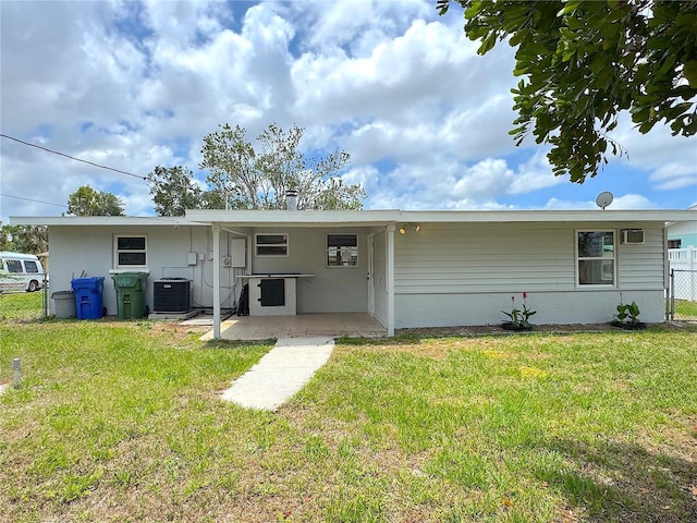 1902 24th Ave W, Bradenton, FL 34205 - rear view of house with cooling unit and stucco siding
