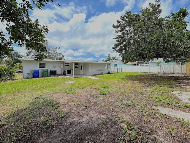 1902 24th Ave W, Bradenton, FL 34205 - rear view of property featuring central AC and a patio