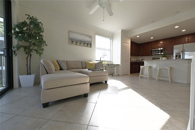 16904 Vardon Ter Unit 208, Lakewood Ranch, FL 34211 - living room with ornamental molding, plenty of natural light, a ceiling fan, light tile patterned flooring, and recessed lighting