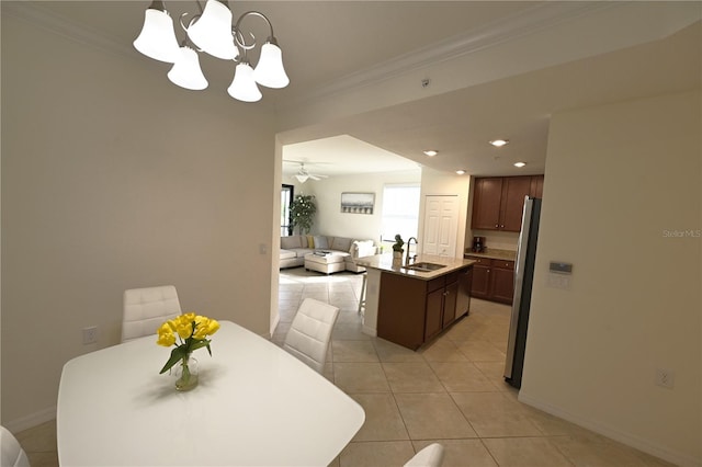 16904 Vardon Ter Unit 208, Lakewood Ranch, FL 34211 - dining room with a chandelier, crown molding, light tile patterned floors, baseboards, and recessed lighting