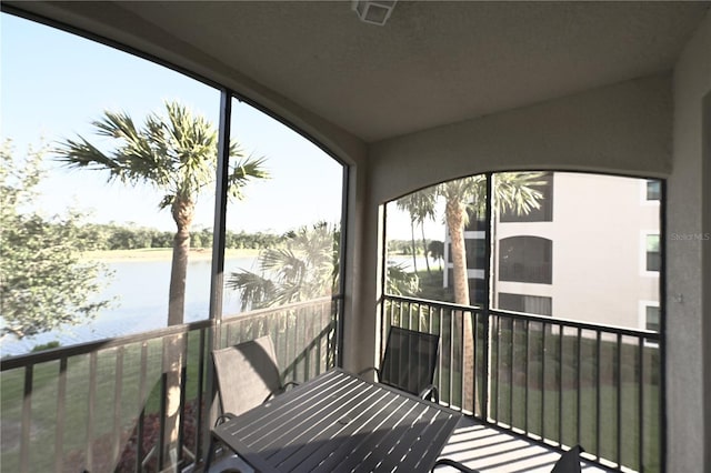 16904 Vardon Ter Unit 208, Lakewood Ranch, FL 34211 - balcony featuring a water view and outdoor dining area