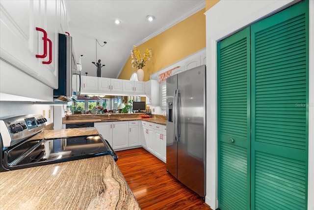 kitchen with stainless steel appliances, white cabinets, dark wood-style floors, crown molding, and a sink