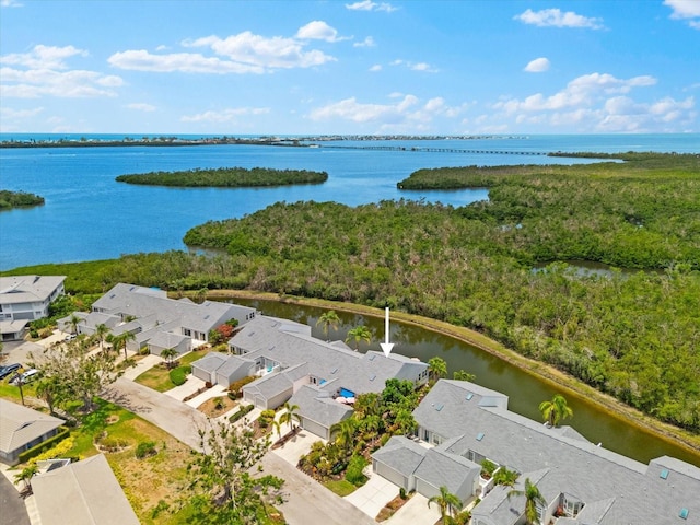 aerial perspective of suburban area featuring a nearby body of water