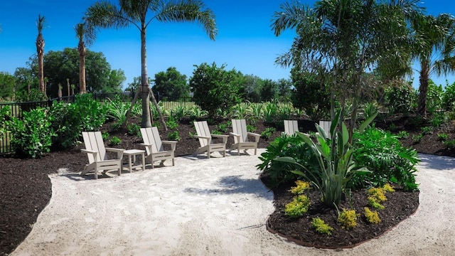 view of patio / terrace featuring fence