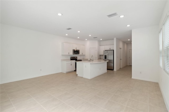 9064 Driven Snow St, Sarasota, FL 34241 - kitchen with stainless steel appliances, a sink, open floor plan, recessed lighting, and light countertops